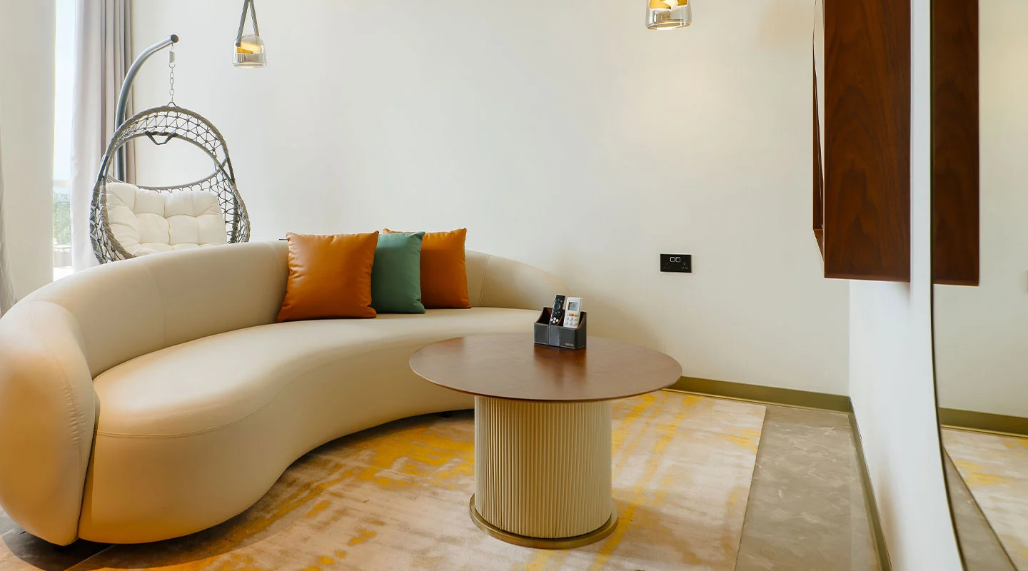 Spacious hotel living room with modern seating and decor at Abantu Hotel in Mikocheni, Dar es Salaam