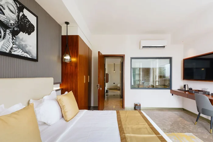 Deluxe with partial sea view with King bed, working area and smart TV.