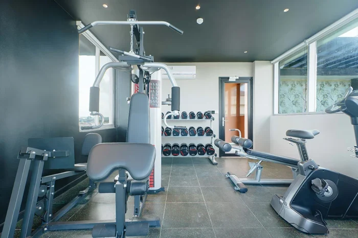 Gym withfitness equipment and a bright, welcoming space for guest workouts.