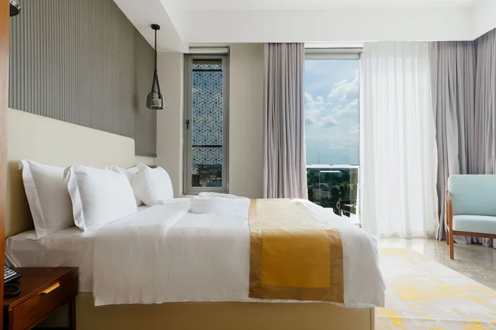 Spacious King Room with king bed at Abantu Hotel in Mikocheni, Dar es Salaam.