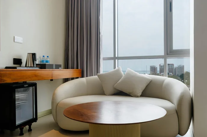 Sofa and low tea table set up for lounging in the Suite.